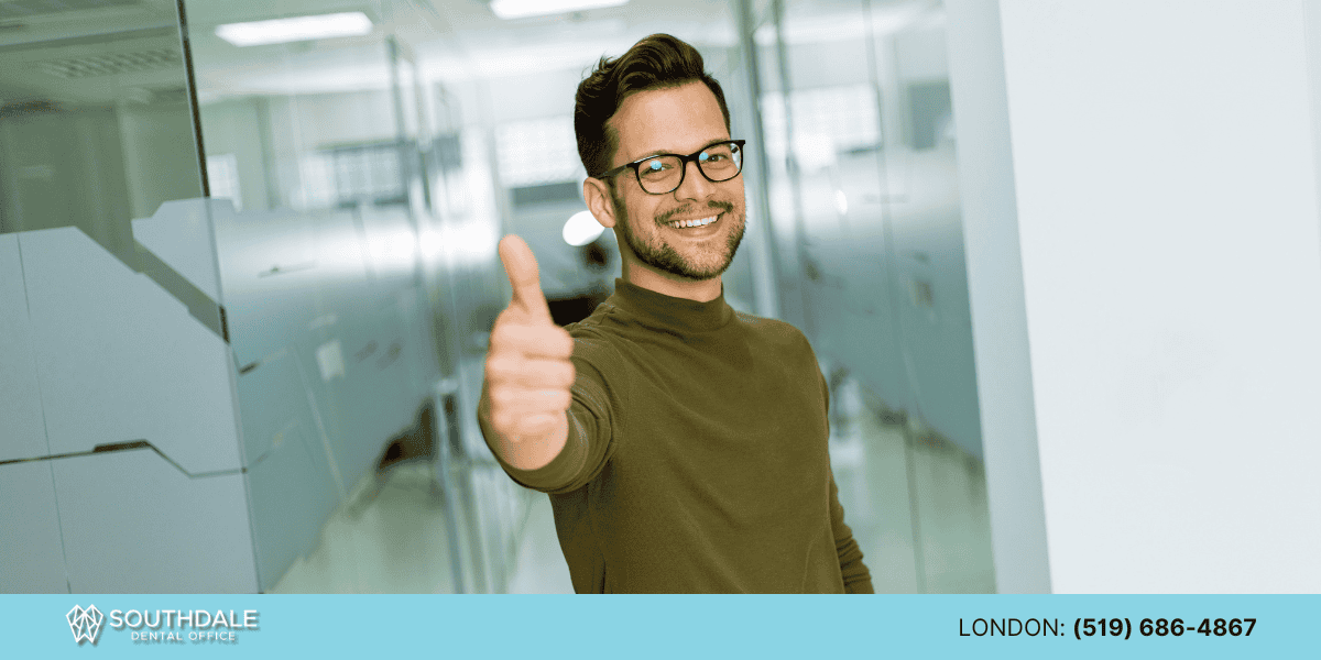 Smiling patient after Invisalign underbite consultation